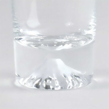 Clear glass tumbler on a white background