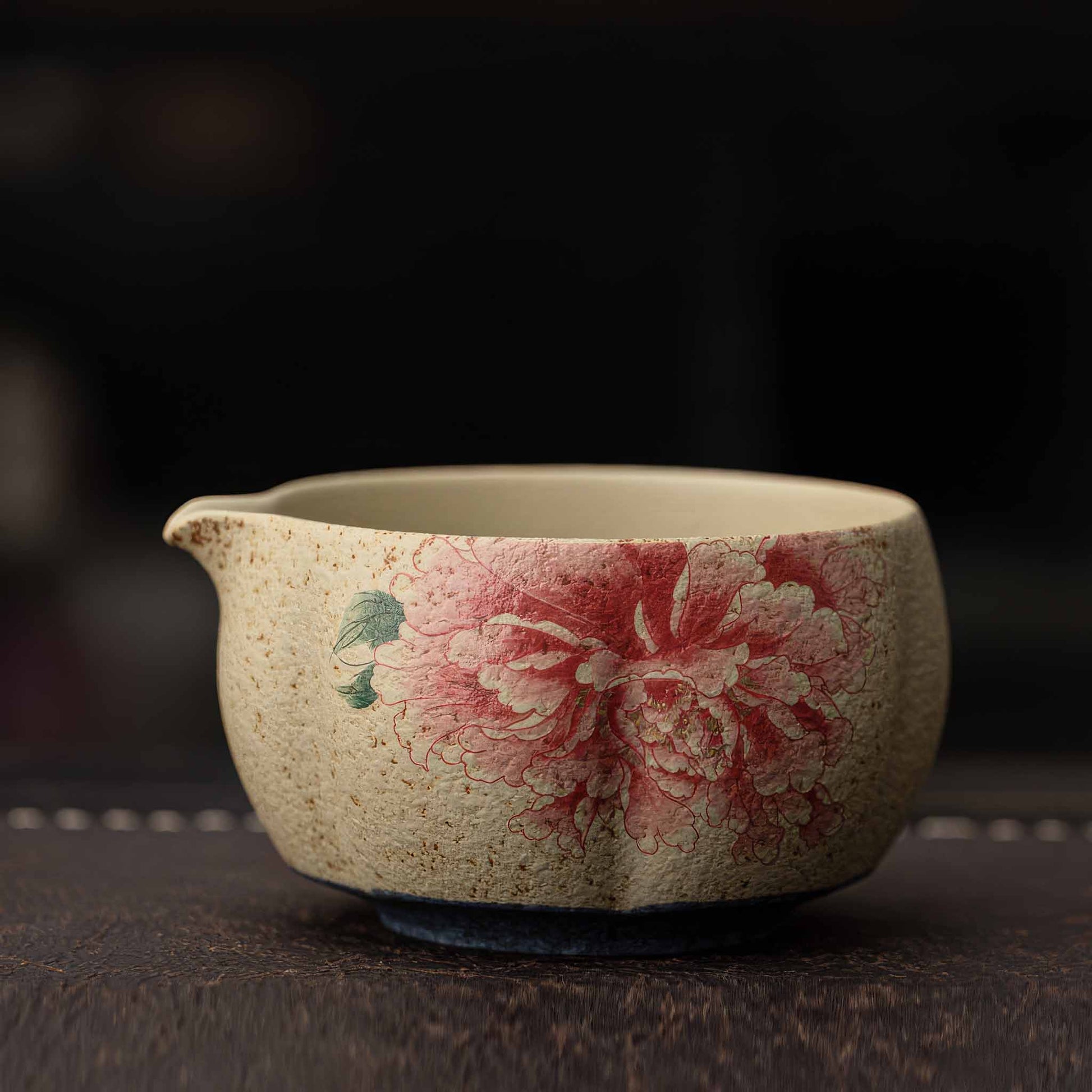 A Handcrafted matcha bowl set, made from high-quality, natural materials, with a beautiful, unique design.