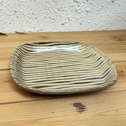 Handmade slipware square plate with hand-applied surface patterns, created by Japanese ceramicist Momoko Shiohata.