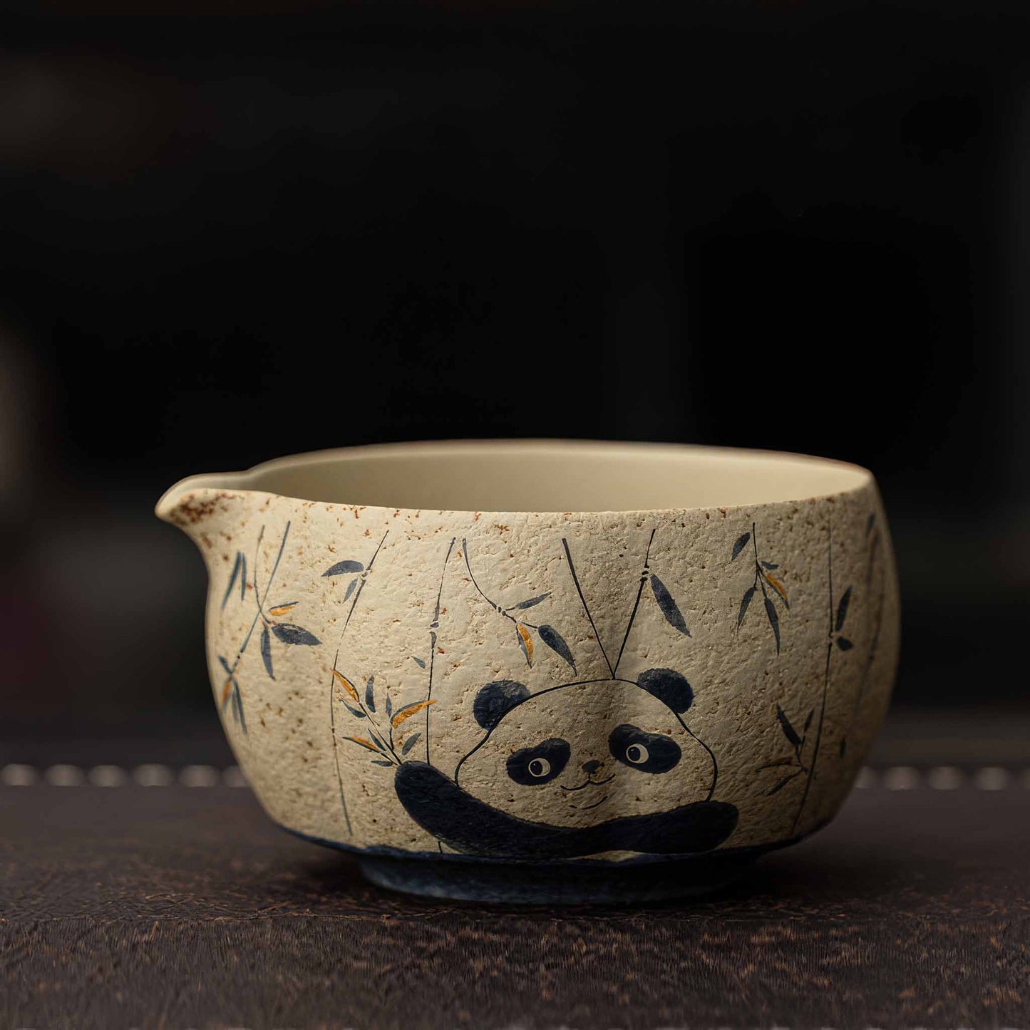 Hand-painted blue and white flint red matcha bowl set with a charming panda design, accompanied by a tea strainer, whisk, and scoop.