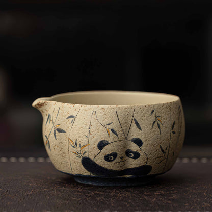 Hand-painted blue and white flint red matcha bowl set with a charming panda design, accompanied by a tea strainer, whisk, and scoop.