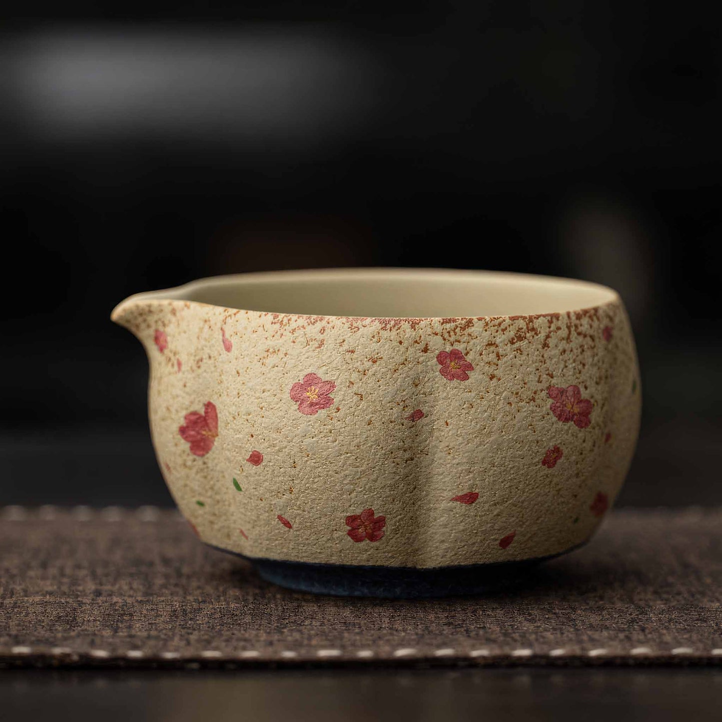 A hand-painted, handcrafted, and hand-finished matcha bowl set with a natural, earthy feel, made from flint red and blue and white ceramic materials.